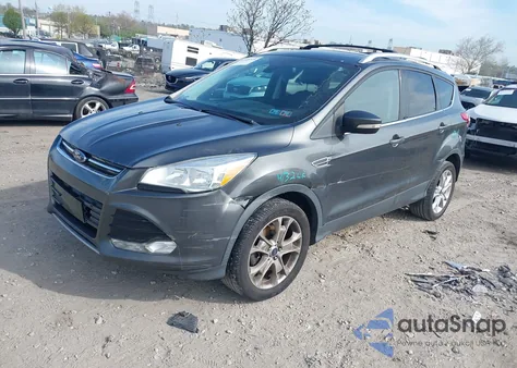 2016 Ford Escape Titanium z USA, uszkodzony, nr VIN 1FMCU9J95GUB85602